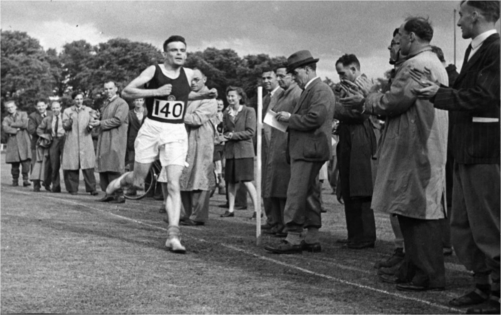 Enduring Turing: You probably already knew that Alan Turing was an outstanding Computer Scientist, but did you know he was also a respectable athlete too? Turing ran, cycled and rowed to relieve stress, and came close to competing in the Olympics as a runner (Kottke 2018). This should come as no surprise, the connections between well-being and academic performance are widely documented. Image via Jonathan Swinton’s biography Alan Turing’s Manchester. (Swinton 2019) The copyright holder for this image has been unidentifiable or unresponsive at their self-advertised contact details.