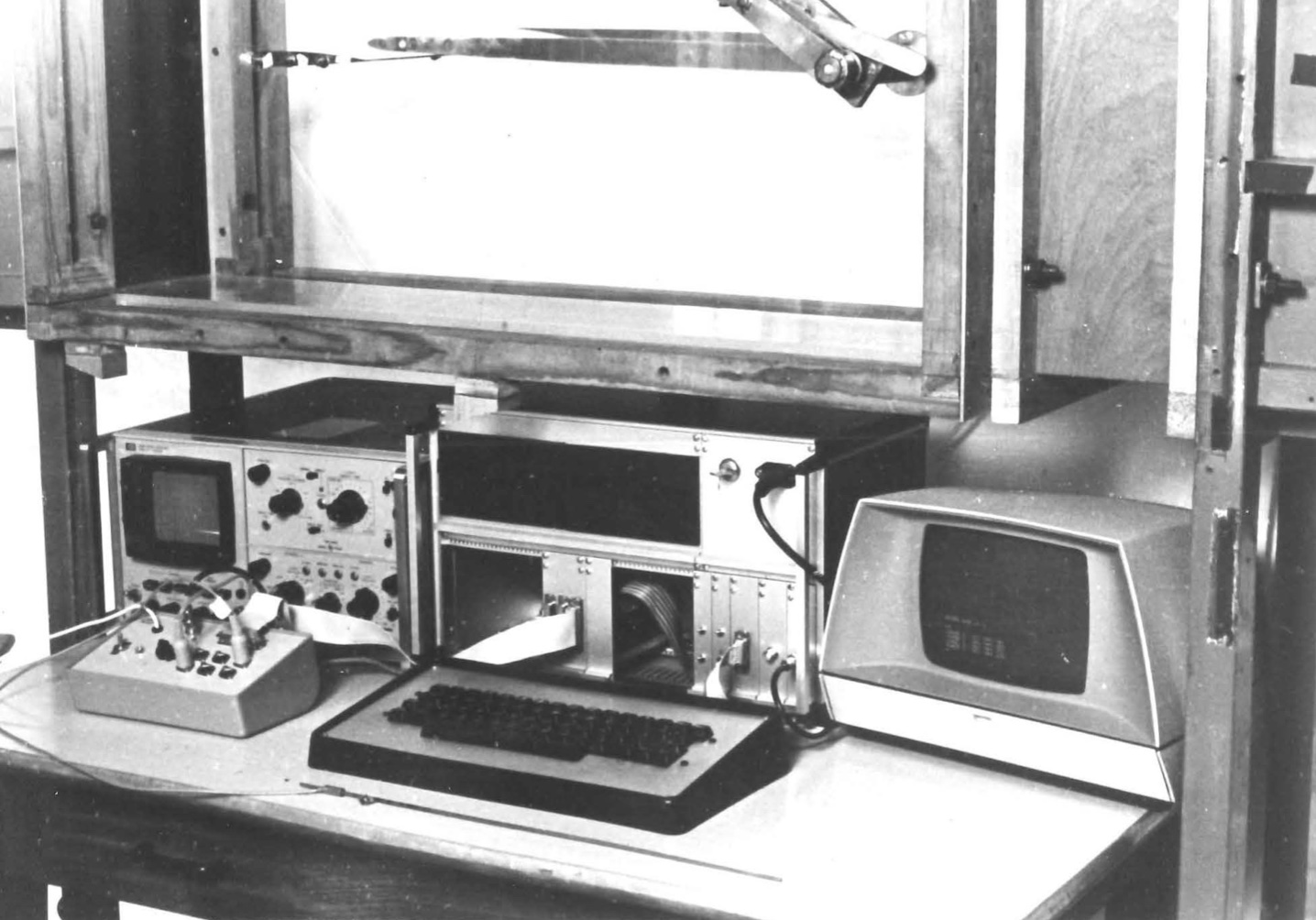 Steve’s home-built computer, the 2-level rack behind the keyboard, was used to log data in the Whittle laboratory and subsequently write his thesis. It became a test-bed for some of the key concepts behind the BBC Micro. Picture reproduced from PhD thesis with permission. (Furber 1980)
