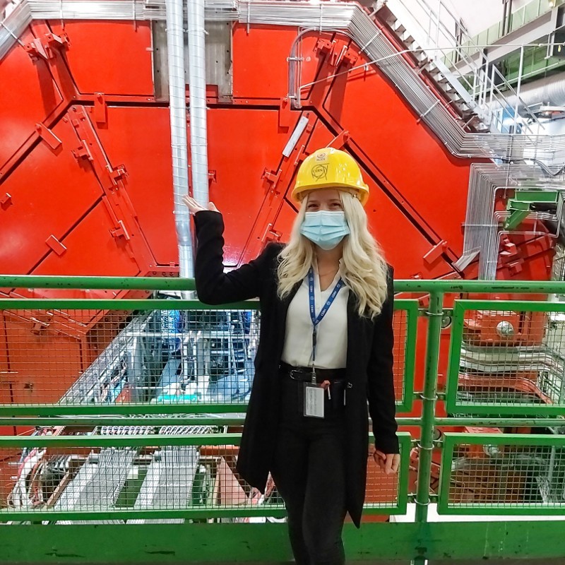 Raluca Cruceru is a software engineer at CERN, standing here in front of the experiment she works on: A Large Ion Collider Experiment (ALICE) part of the Large Hadron Collider at CERN, see careers.cern/Raluca. Picture reused with permission from linkedin.com/in/raluca-cruceru, thanks Raluca.